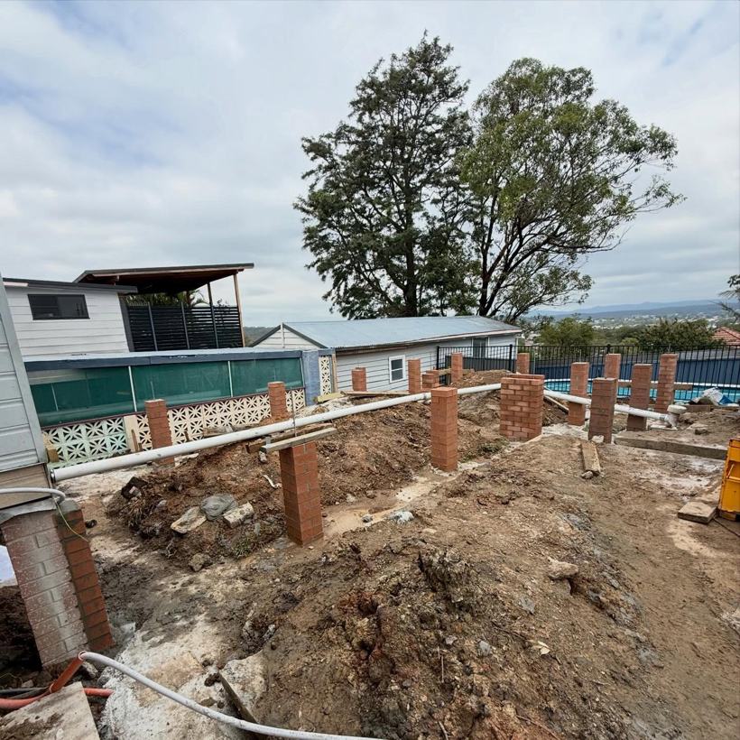 Row of brick subfloor piers on a building site